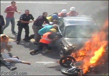 Man-pushed-under-burning-car.gif