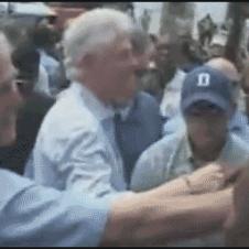 Bush_handshake_wipe_Clinton