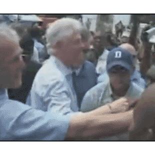 Bush_handshake_wipe_Clinton