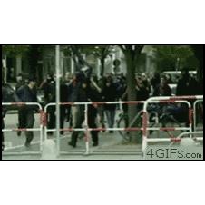 Riot-cop-jump-kicked