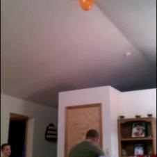 Dad-throws-kid-balloon-catch