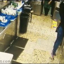 Waitress kicks cup into sink