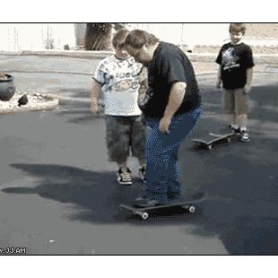 A fat dad tries and fails to use a skateboard.