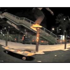 Jumps bollards onto skateboard