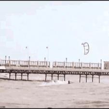 Kite surf over pier