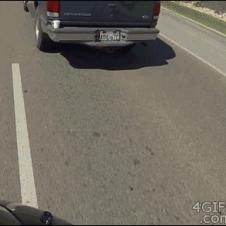 Motorcyclist saves cup.