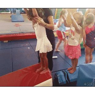 Girl-tumbling-gymnastics-roll-fail