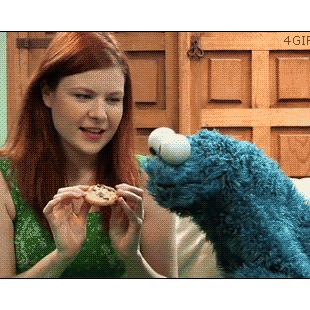 The Cookie Monster is teased with a cookie.