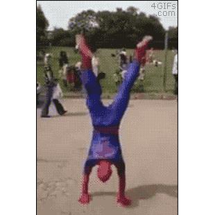 Spider-Man hits a spectator while doing backflips.