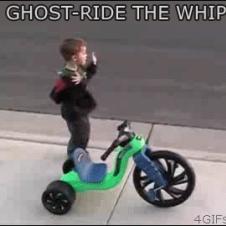 A kid ghost rides his ride.