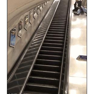 Drunk-guy-slides-down-escalator