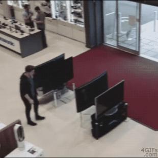 Customer-knocks-over-TVs