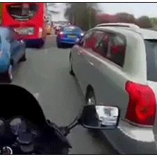 Polite-motorcyclist-fixes-mirror